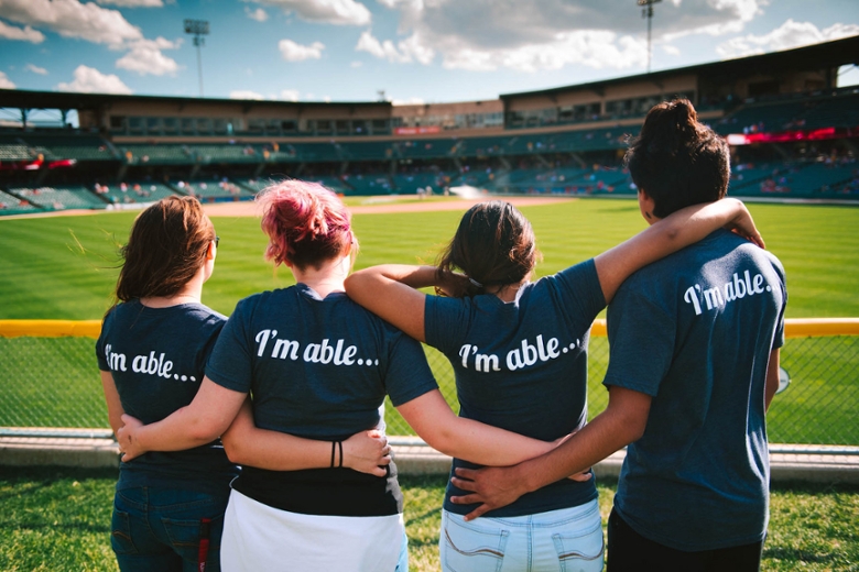 Upward Bound students overlooking a baseball diamond