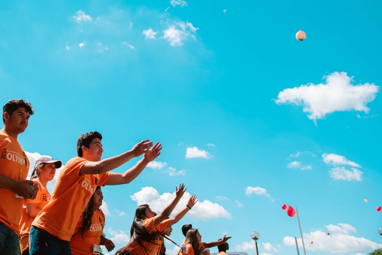 Students having a water balloon toss