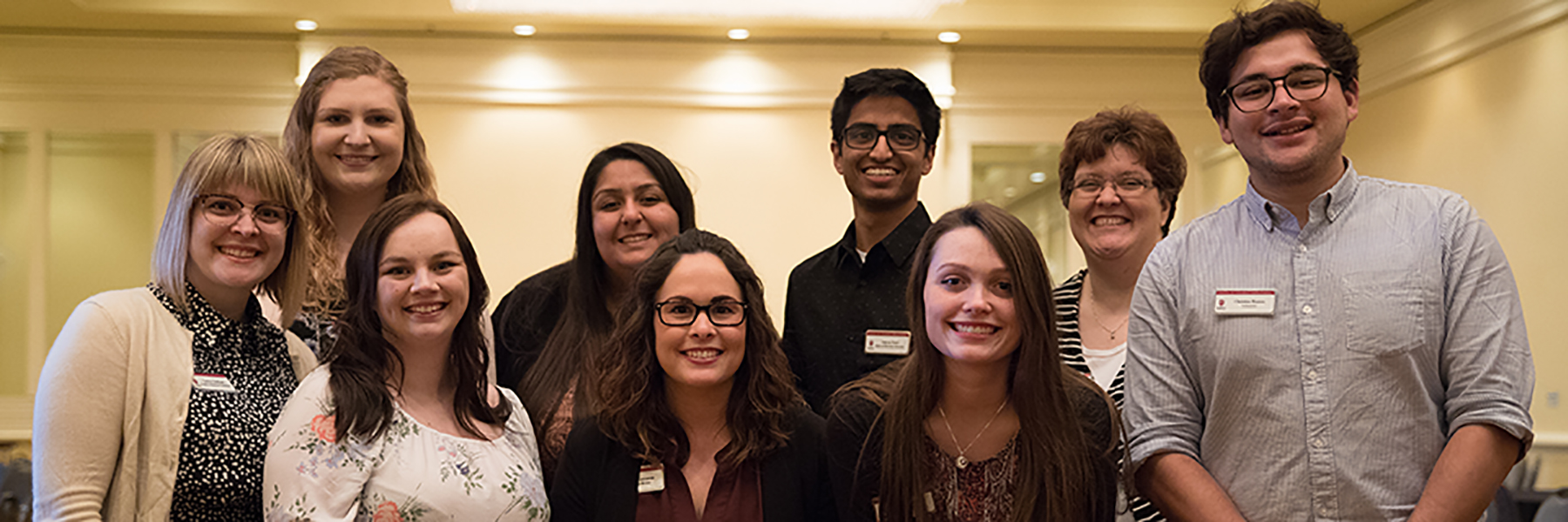 Brianne Karazsia poses alongside colleagues and Assistant Director of Student Employment Services and Assessment.