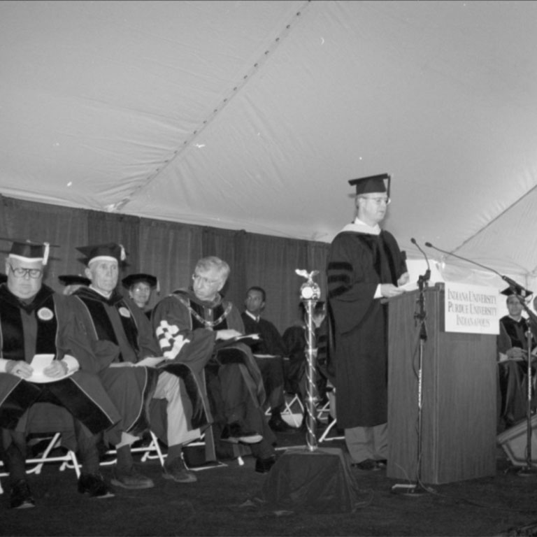 Individuals gathered for a ceremony